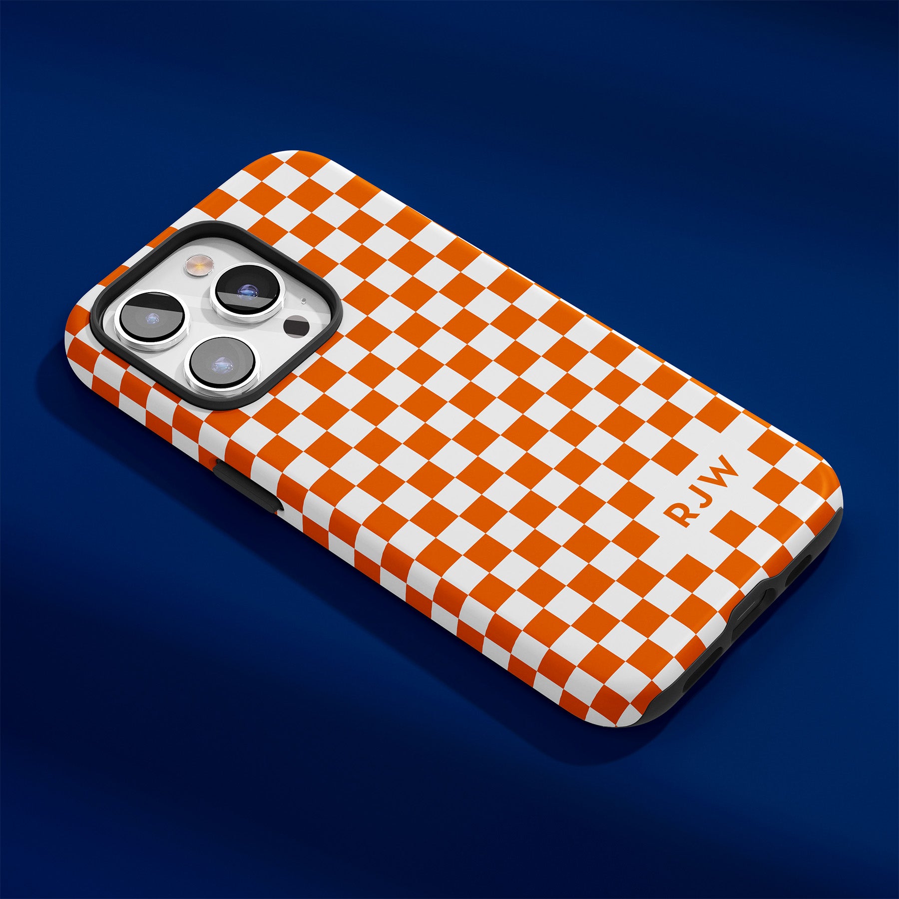 Personalizable orange and white checkered phone case for Auburn fans – add your name or initials for a unique Tiger spirit accessory!