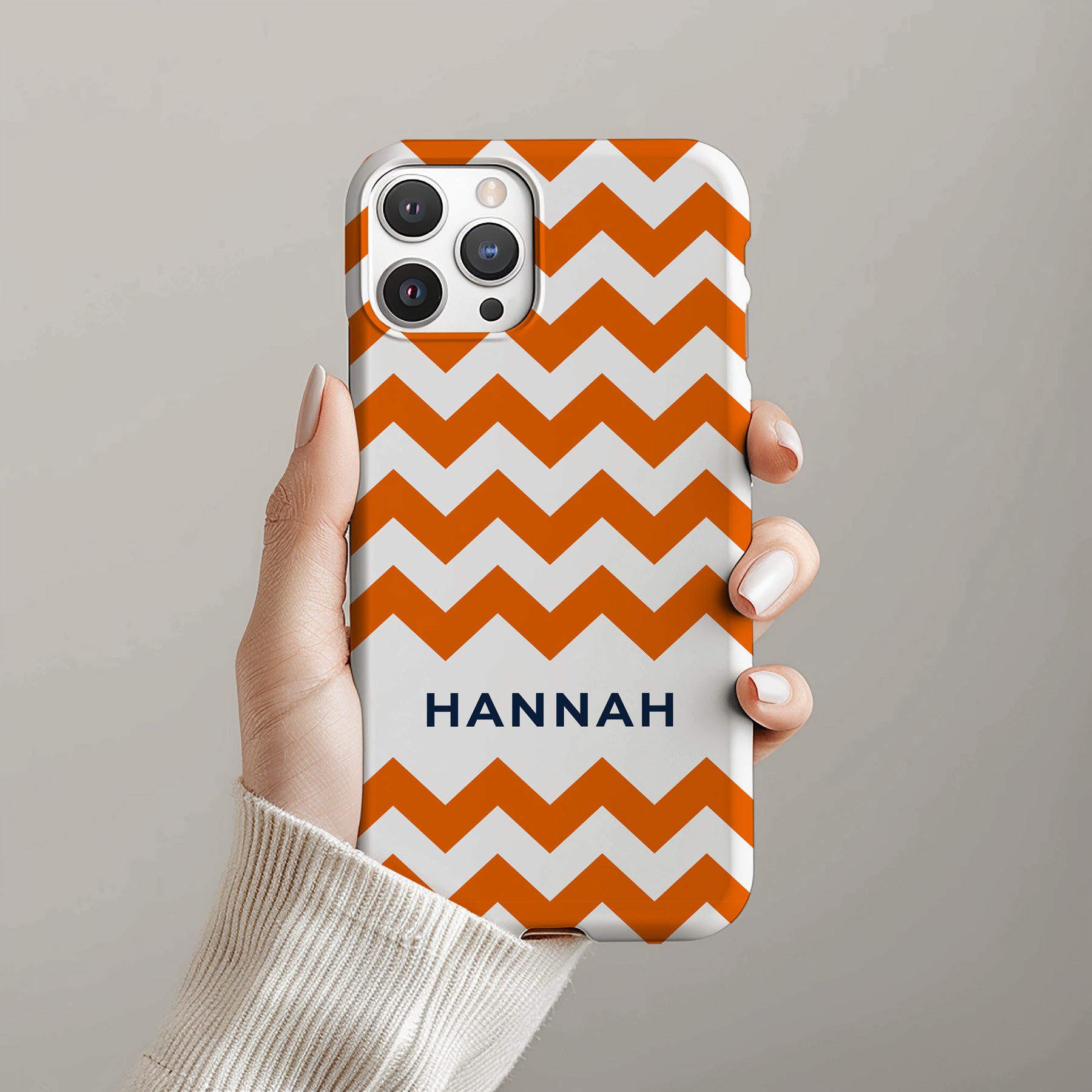 Personalizable orange and white zigzag phone case for Auburn fans – a playful, bold design that adds a stylish twist to your Tiger pride with a monogrammed touch!