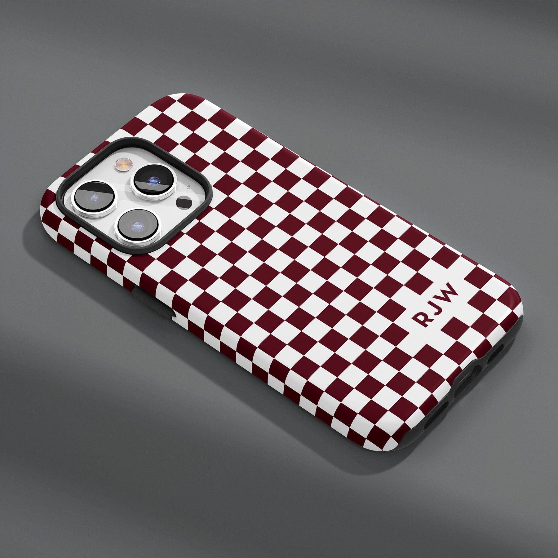 Personalizable maroon and white checkered phone case for Bulldog fans – add your name or initials for a unique and spirited accessory!