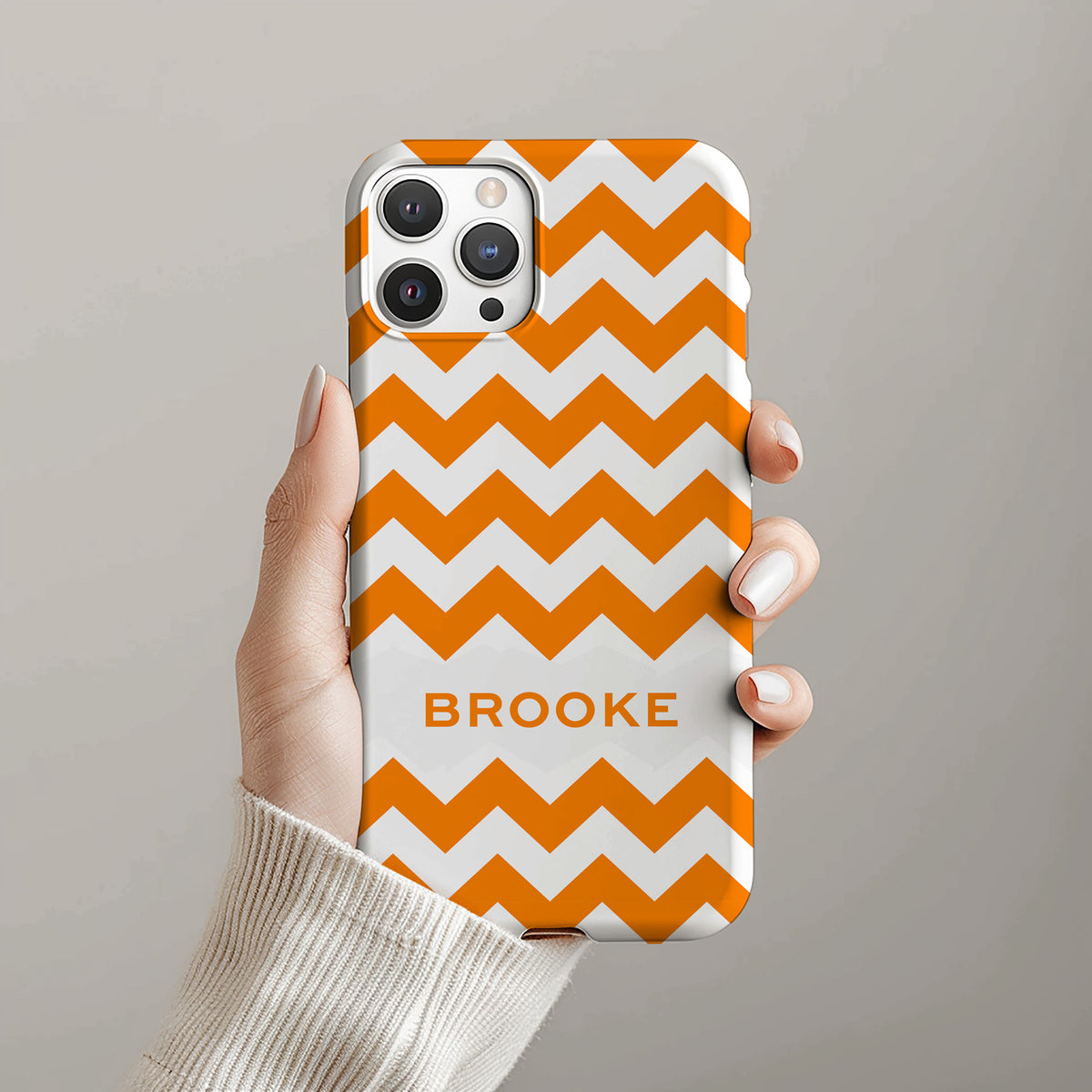 Personalizable orange and white zigzag phone case for Tennessee fans – a playful and fun design that adds a bold, stylish twist to your Volunteer pride with a monogrammed touch!