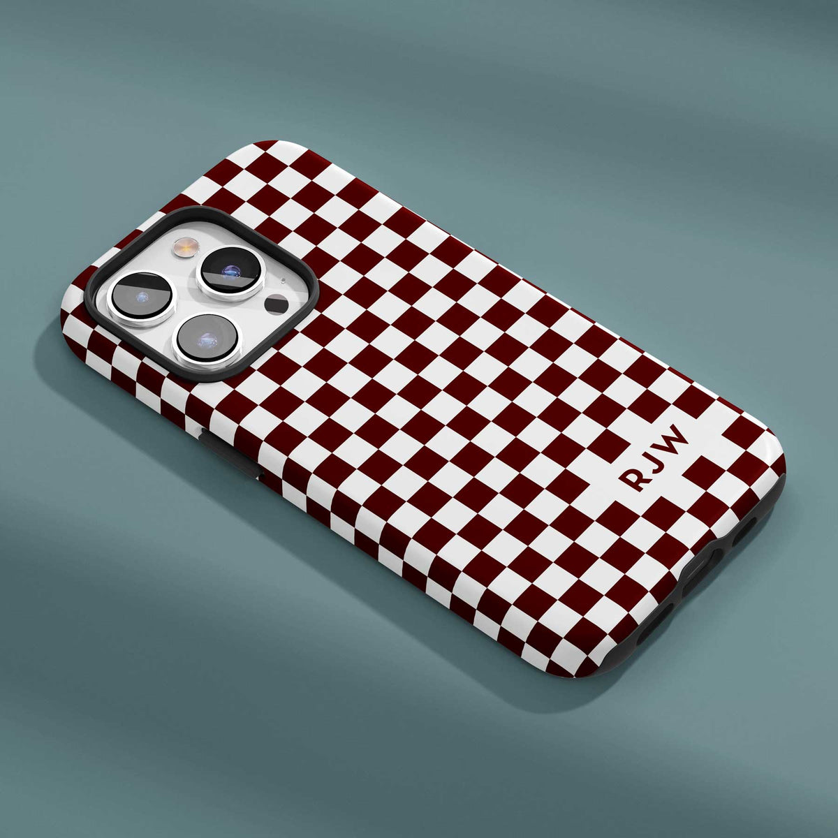 Aggies will love this stylish maroon and white checkered phone case.