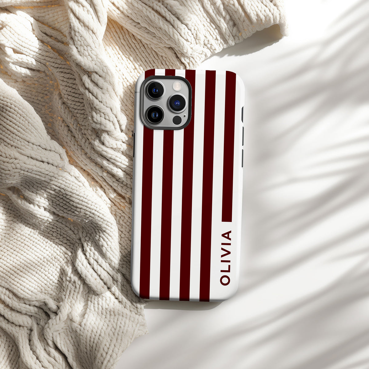 Stylish Aggie fans will love our bold striped phone case.