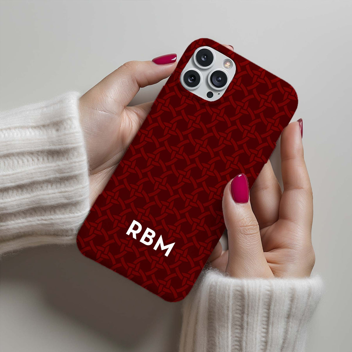 Personalizable maroon basketweave phone case for Texas fans – a chic, interlocking circle design that brings a timeless and elegant touch to your everyday style.