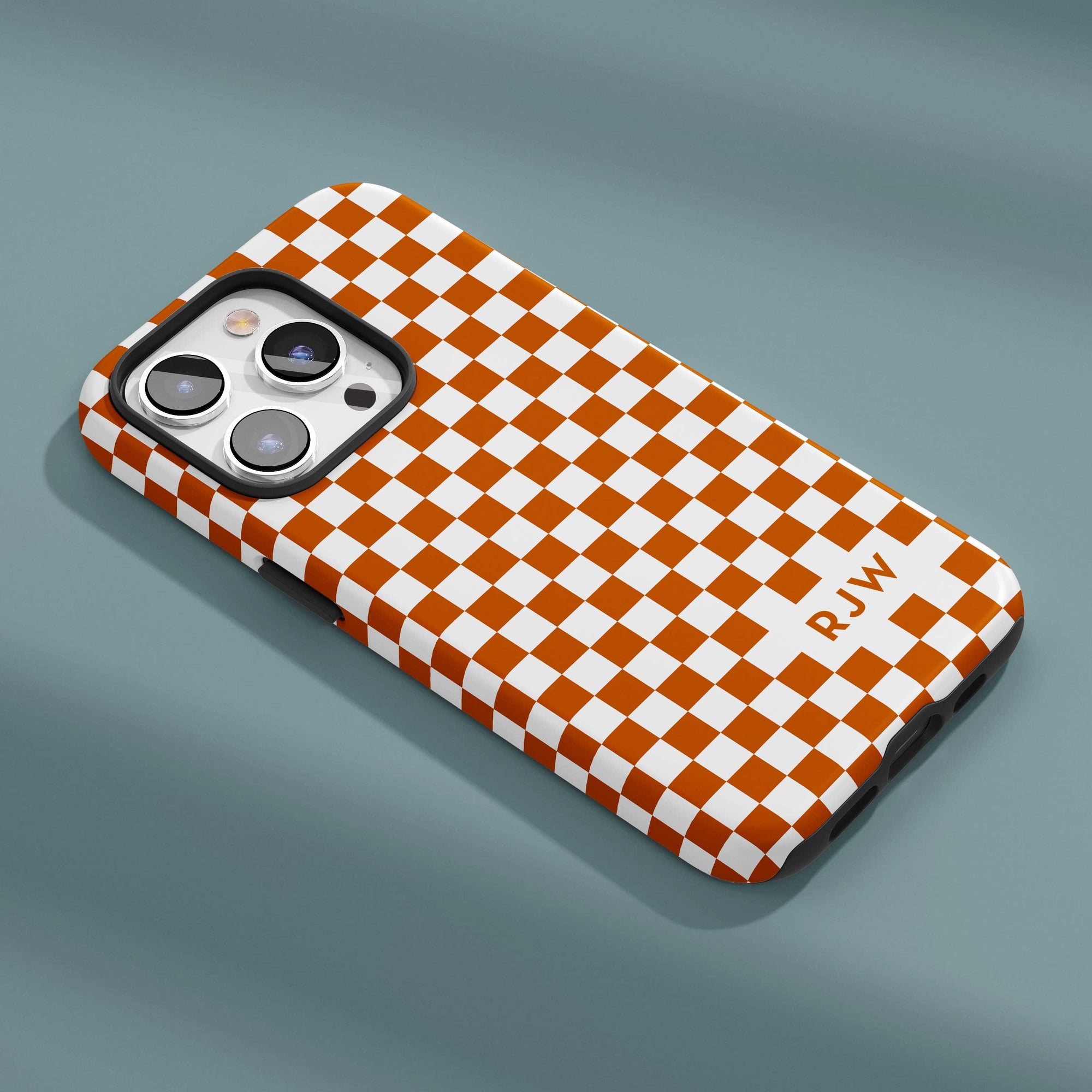 Personalizable burnt orange checkered phone case for Texas fans – a subtle, sophisticated tone-on-tone design that adds timeless style and refined texture.