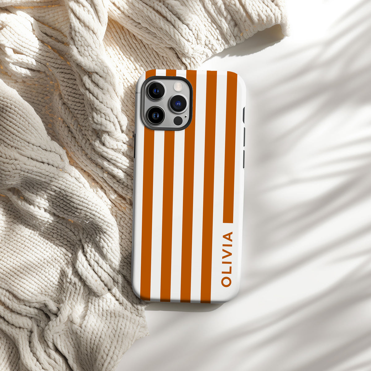 Personalizable burnt orange and white striped phone case for Texas fans – bold, clean lines create a sleek, classic look with refined simplicity.