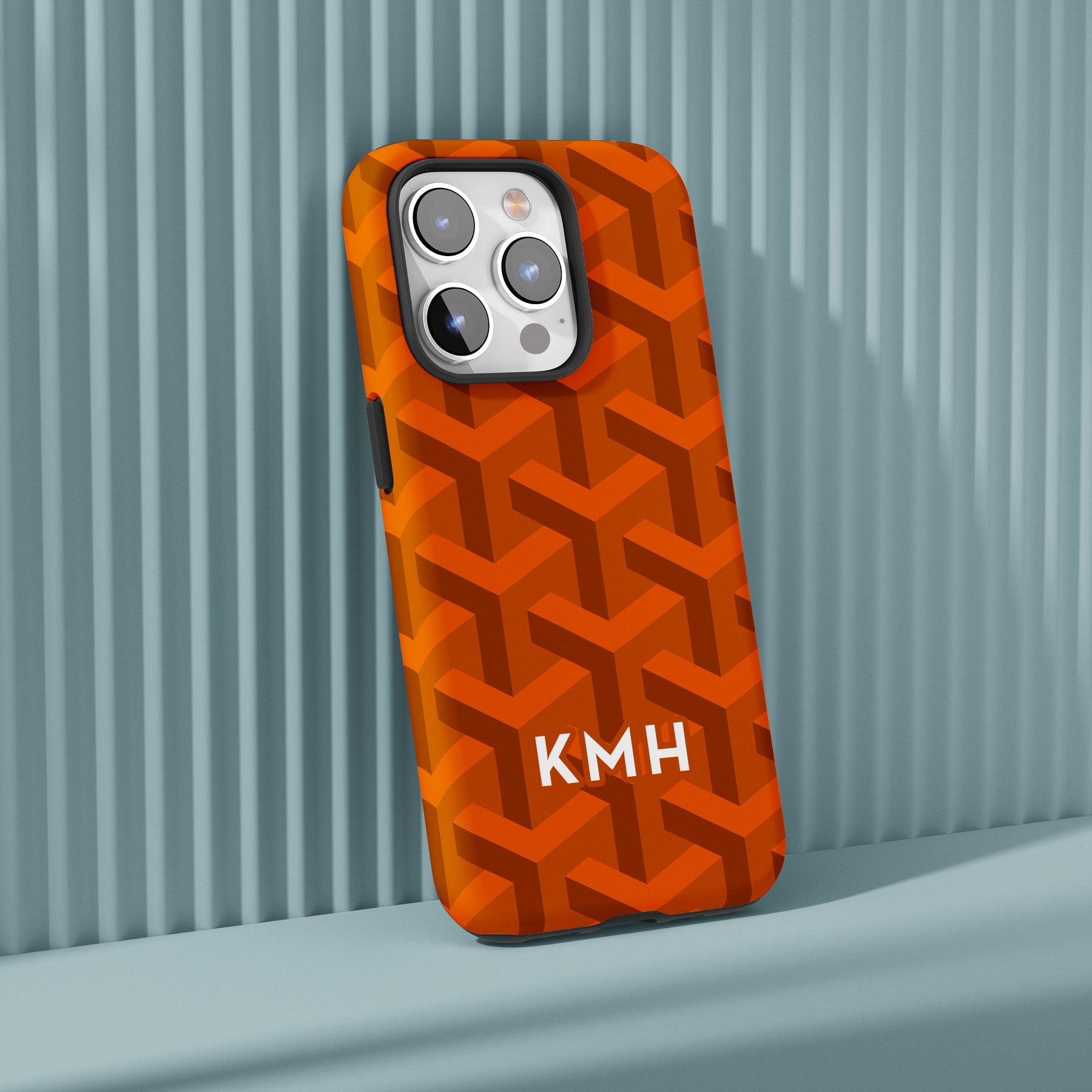 Personalizable burnt orange geometric phone case for Texas fans – featuring an intricate, luxury-inspired pattern for a refined, stylish look.