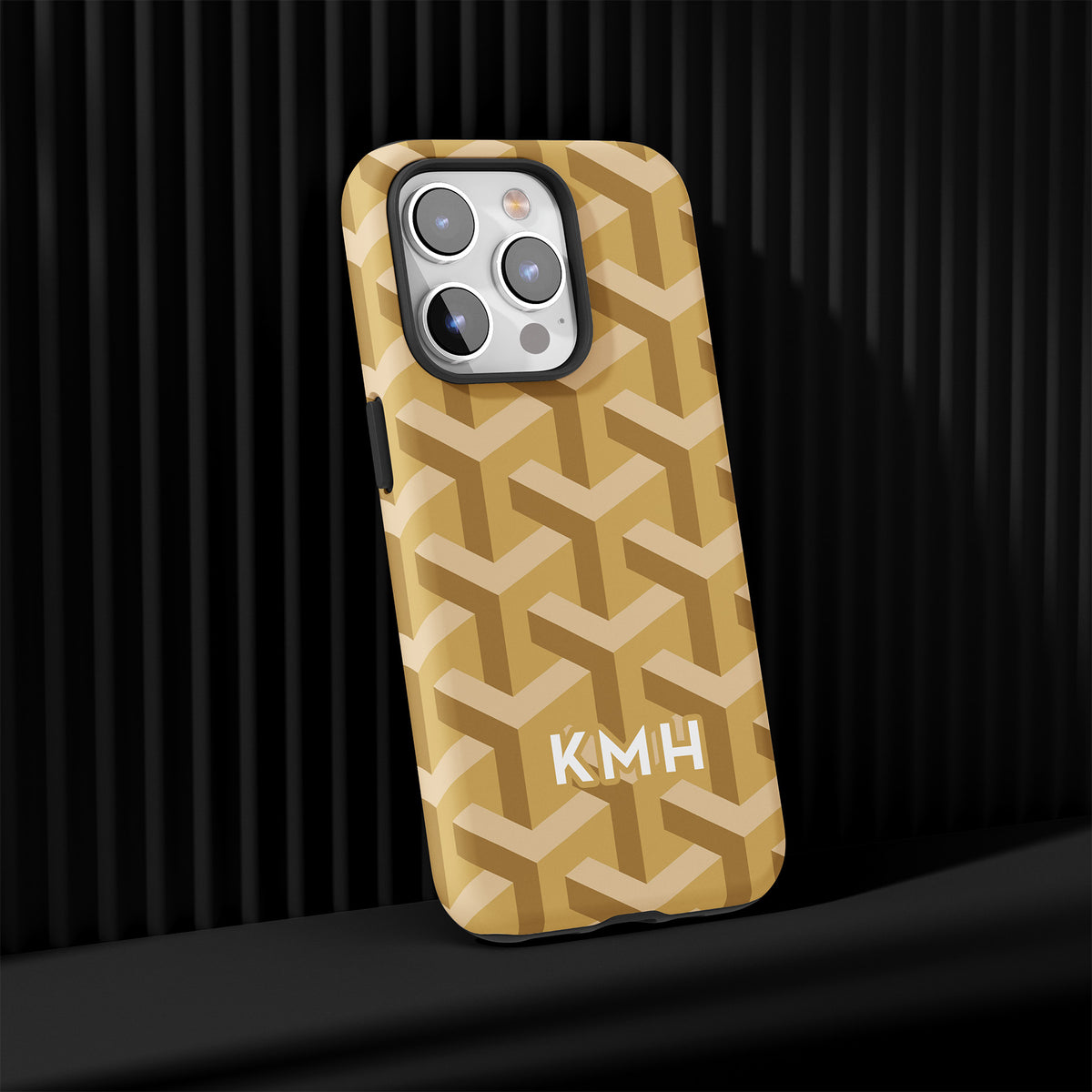 Personalizable interlocking geometric phone case from Nashville Gold – a luxury-inspired tone-on-tone design that adds understated elegance and chic texture.