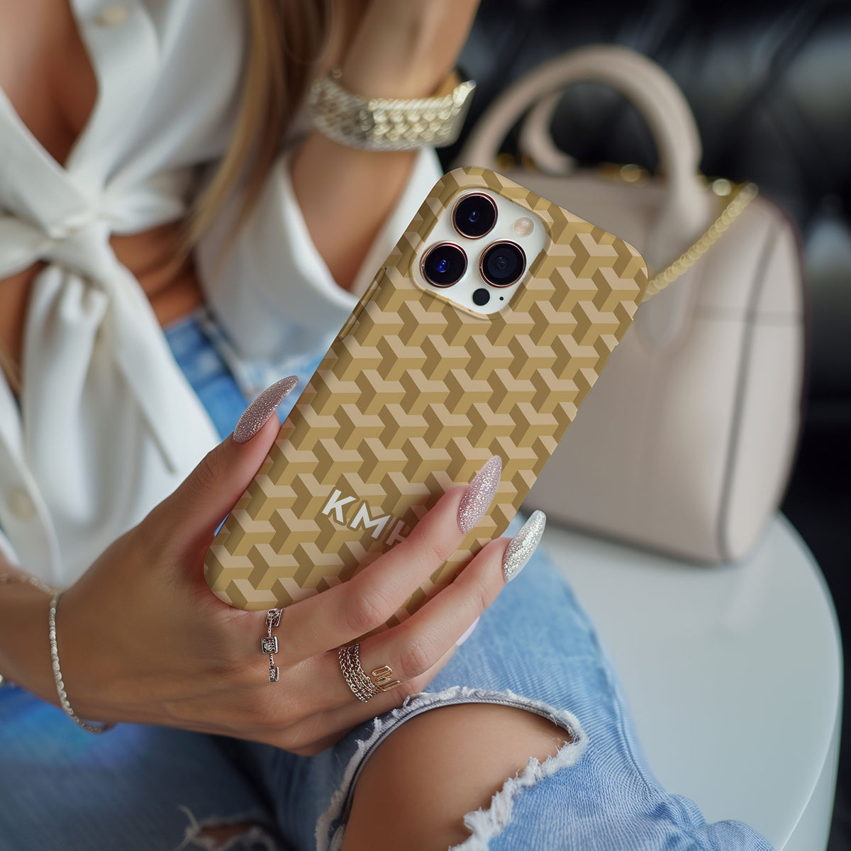 Personalizable interlocking cubes phone case from Nashville Gold – bold, tone-on-tone 3D design that adds depth and sophistication for a striking style.